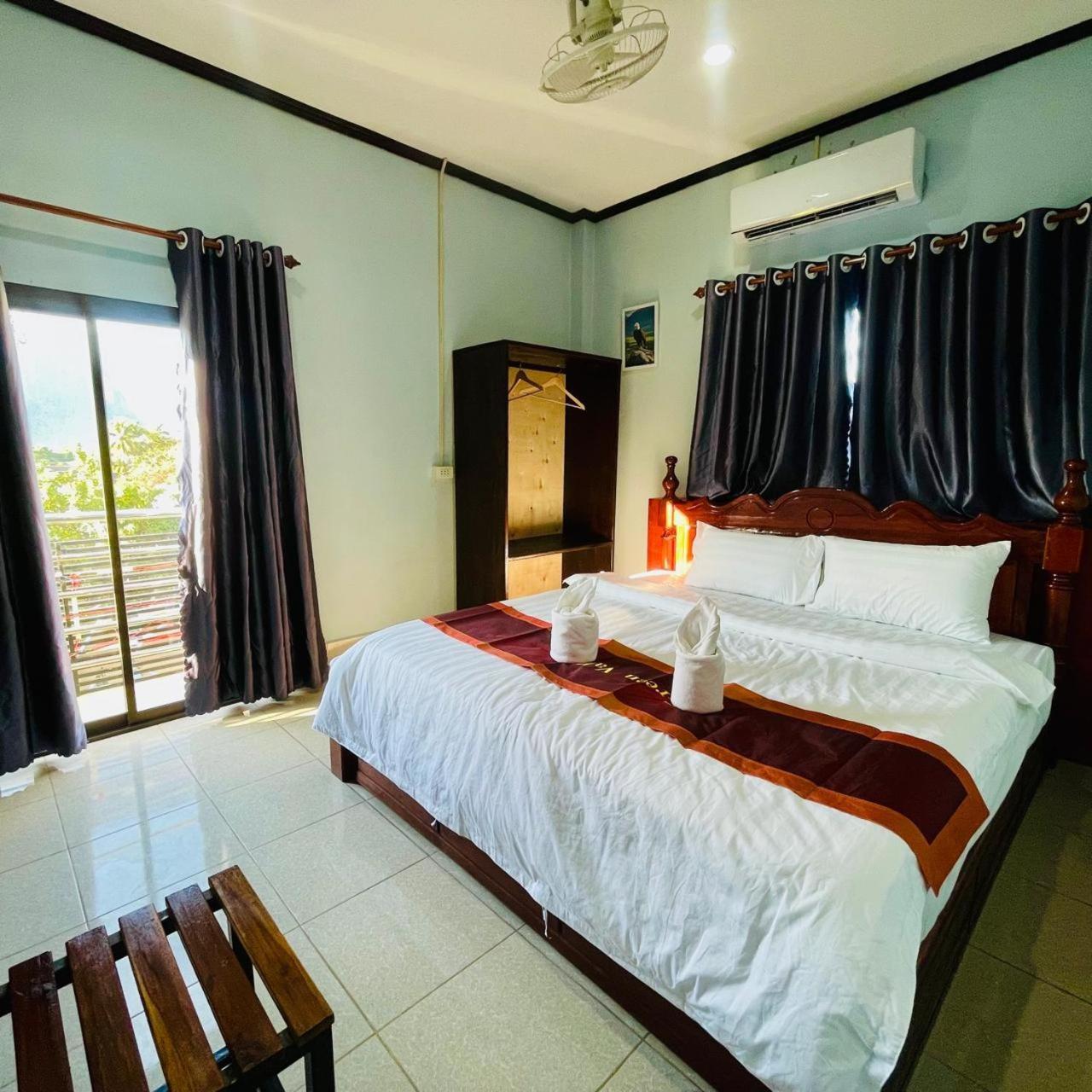 ואנג ויינג Smile Guesthouse Vangvieng מראה חיצוני תמונה